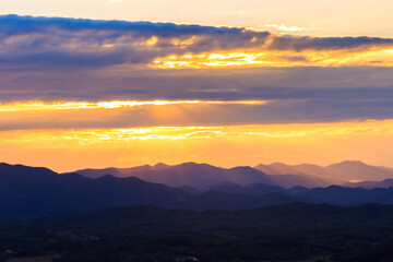 World environment day concept: Green mountains and beautiful blue sky clouds 