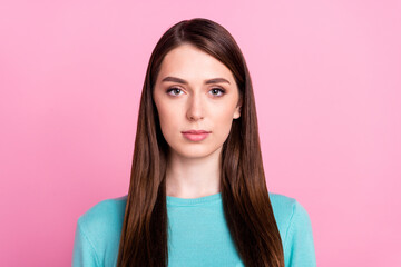 Portrait of nice-looking attractive content girl wearing blue pullover isolated over pink pastel color background