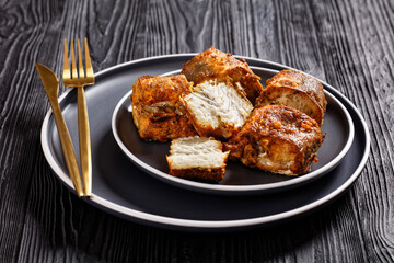 fried pieces of hake on a plate