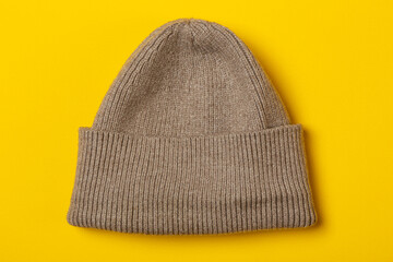 light brown Beanie Hat on a yellow background