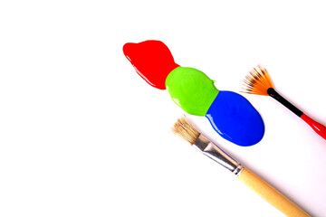 Brush and oil paint isolated on white background.