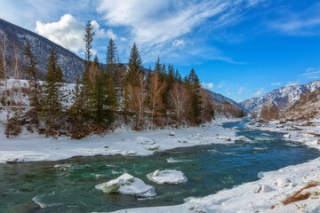 Winter landscape. River in Altai on a sunny day. Russia