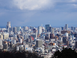 Fototapeta na wymiar 高所から見下ろした札幌の町並み