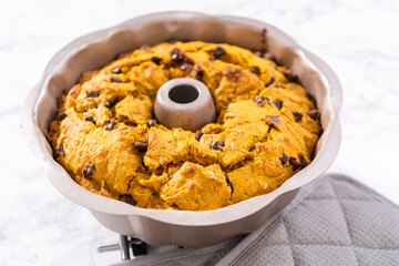 Chocolate pumpkin bundt cake with toffee glaze