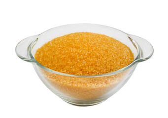 brown organic cane sugar in glass bowl isolated on white background, sweet product and ingredient for cooking and baking cut out