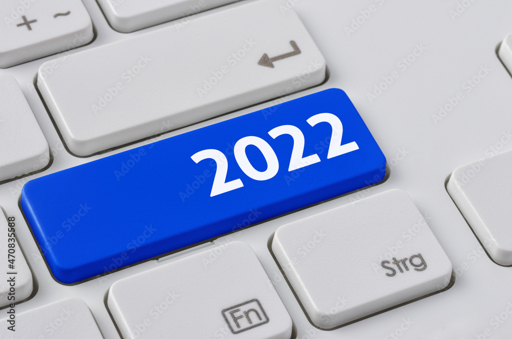 Wall mural a keyboard with a blue button - 2022