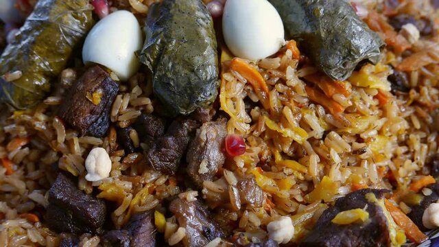 Uzbek plov with eggs and dolma
