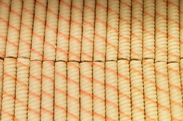 Fototapeta premium Sweet sticks with stuffing wrapped in a roll .