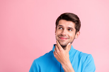 Portrait of young handsome dreamy positive guy look copyspace thinking advertisement isolated on...