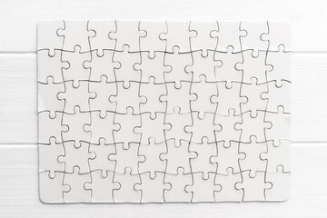 Top view of white jigsaw puzzle