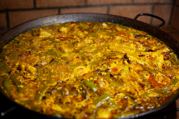 
preparation of typical Valencian paella