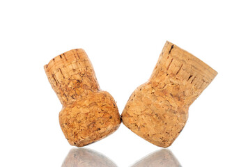 Two corks for a bottle of wine, close-up, isolated on white.