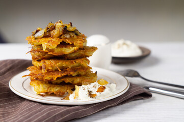 Stack of potato pancakes on a plate