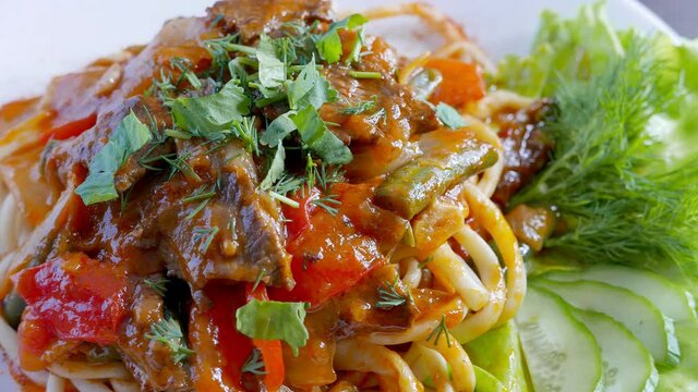 Lagman - uzbek dish with noodles and meat