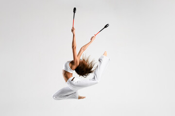 Gymnast in a white suit