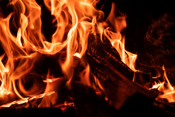 Fototapeta premium Burning orange fire on black background