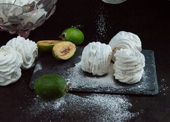 White marshmallow on a dark background.