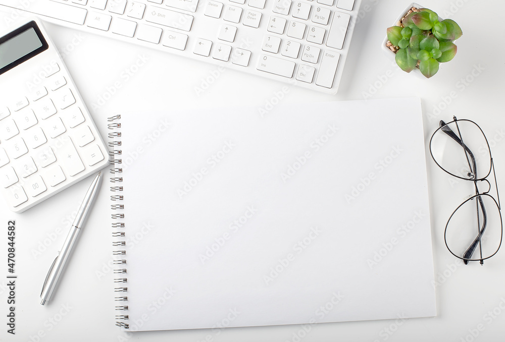 Poster office desk table with keyboard, notepad and calculator. top view with copy space