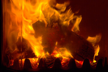 Flames of fire in a fireplace.Abstract background.