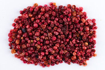 Some dried cowberry isolated on white.