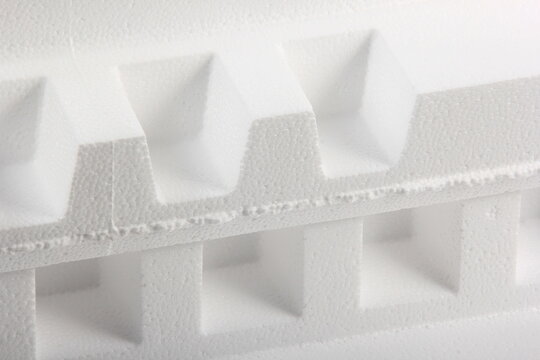 Styrofoam Sheets of different shapes on white background. Pieces of white styrofoam close up. Crumbled styrofoam pieces isolated on white background 