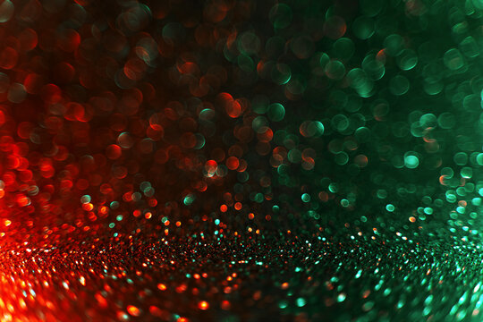 Abstract Christmas traditional green and red gradient glitter background. Great backdrop for any holiday or event. Bokeh light overlay. Color gradient glow.