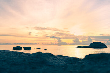 Fototapeta na wymiar Sea lagoon with rocks against the backdrop of a colorful sunrise