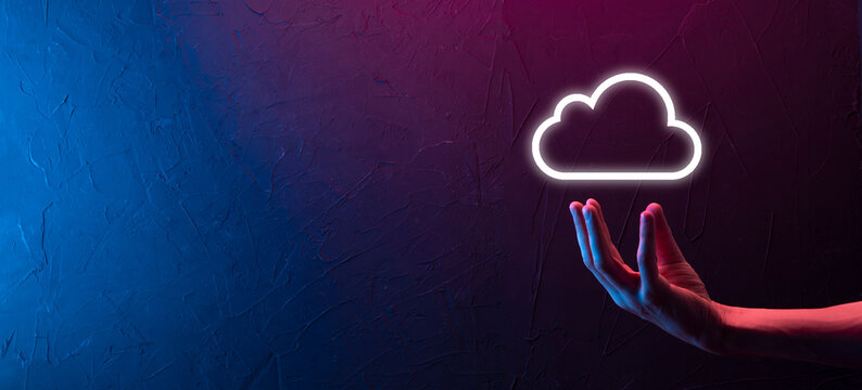 Hand holding icon cloud computing network and icon connection data information in hand. Cloud computing and technology concept.