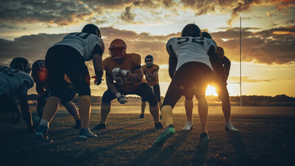 American Football Field Two Teams Compete: Players Pass and Run Attacking to Score Touchdown...