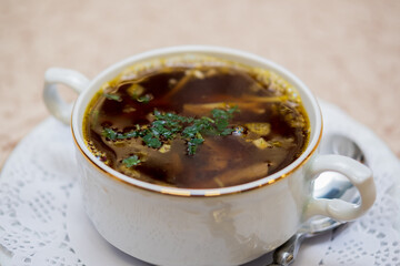 Delicious mushroom soup with herbs