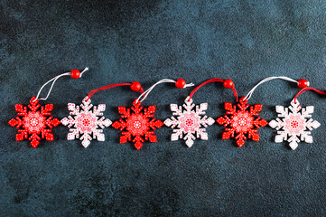 Christmas background. Christmas decorations on dark background. Top view with copy space. New Year flatly. Christmas flatly with decor. New Year composition