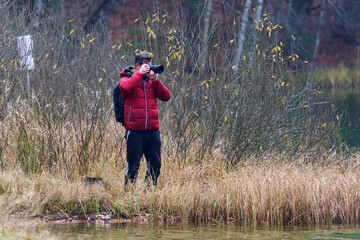 Nature photographer by the lake