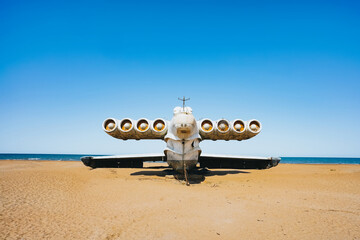 Abandoned military aircraft harrier on the shores of the Caspian Sea - 470881563