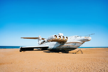 Abandoned military aircraft harrier on the shores of the Caspian Sea