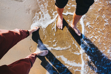 Foot selfie. Couple walking on the sandy seaside - 470881960