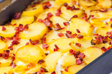 still life of baked potatoes with bacon