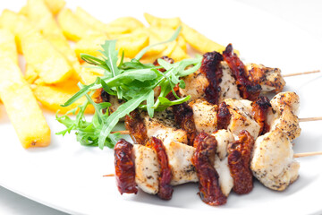 skewers with dry tomatoes and poultry meat