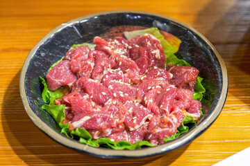 Fototapeta premium Closeup of a dish of marinated pork belly beef barbecue ingredients