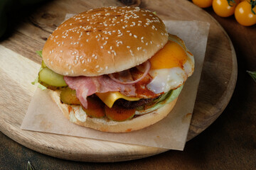 A close up of a sandwich sitting on top of a wooden table
