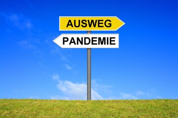 Schild Wegweiser zeigt: Pandemie und Ausweg