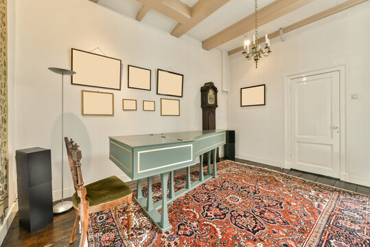 Vintage harpsichord on carpet in room