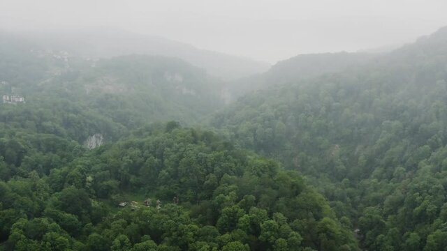 Caucasus. Flight over the mountain river Khosta in the area of yew-boxwood grove. Subtropical forest.