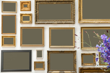 Photo frames on white wall