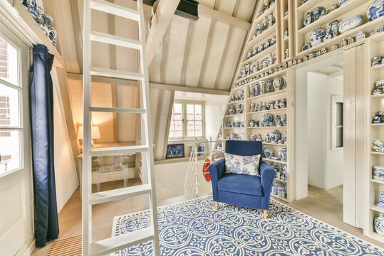 Armchair near collection of gzhel vases