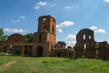 Fototapeta na wymiar View of the ruins of the old castle in Korets, Rivne region, Ukraine. August 2021