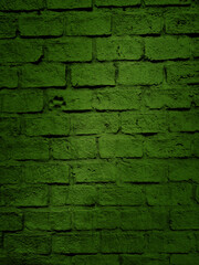 close up shot at the surface of dark green bumpy brick pattern wall with stamped of dog footprint. artificial stone brick wall texture for loft, industrial concept design. high defination image.