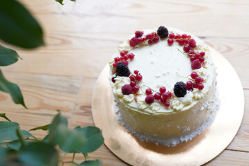 Tasty cake with fresh berries on table, close up