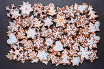 Homemade christmas cookies on slate table