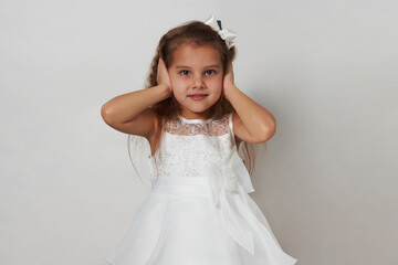 Fototapeta na wymiar Cute girl portrait on a white background with copy space