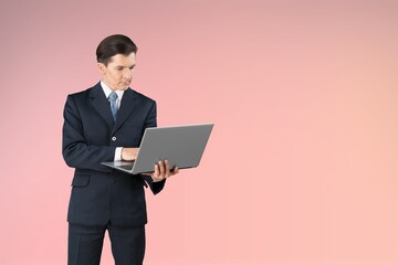 Happy young minded man work on laptop pc computer